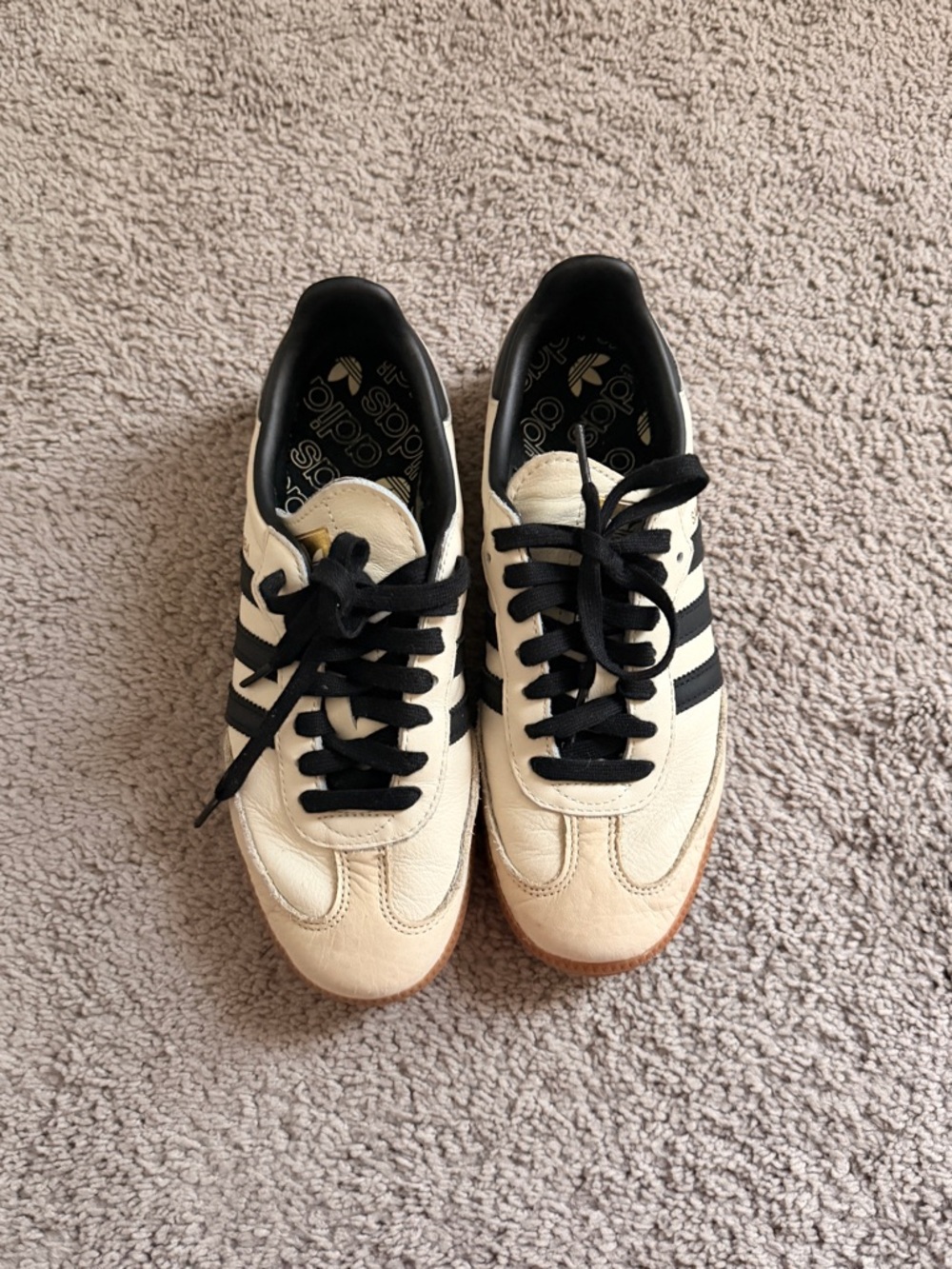 Adidas women’s Cream and Black Sneakers